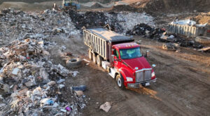 EAI Rolloff truck dumping waste